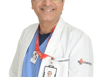 Dr Tarun Grover